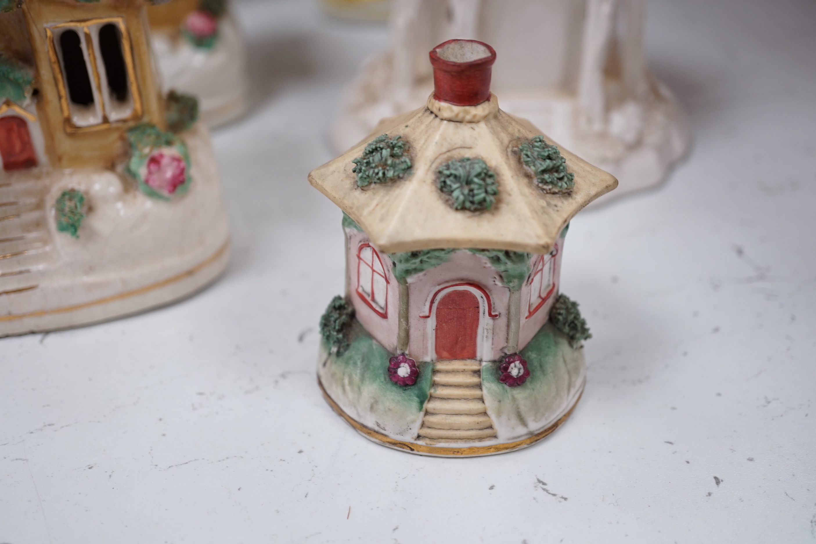 Thirteen Staffordshire 'cottage’ pastille burners or models